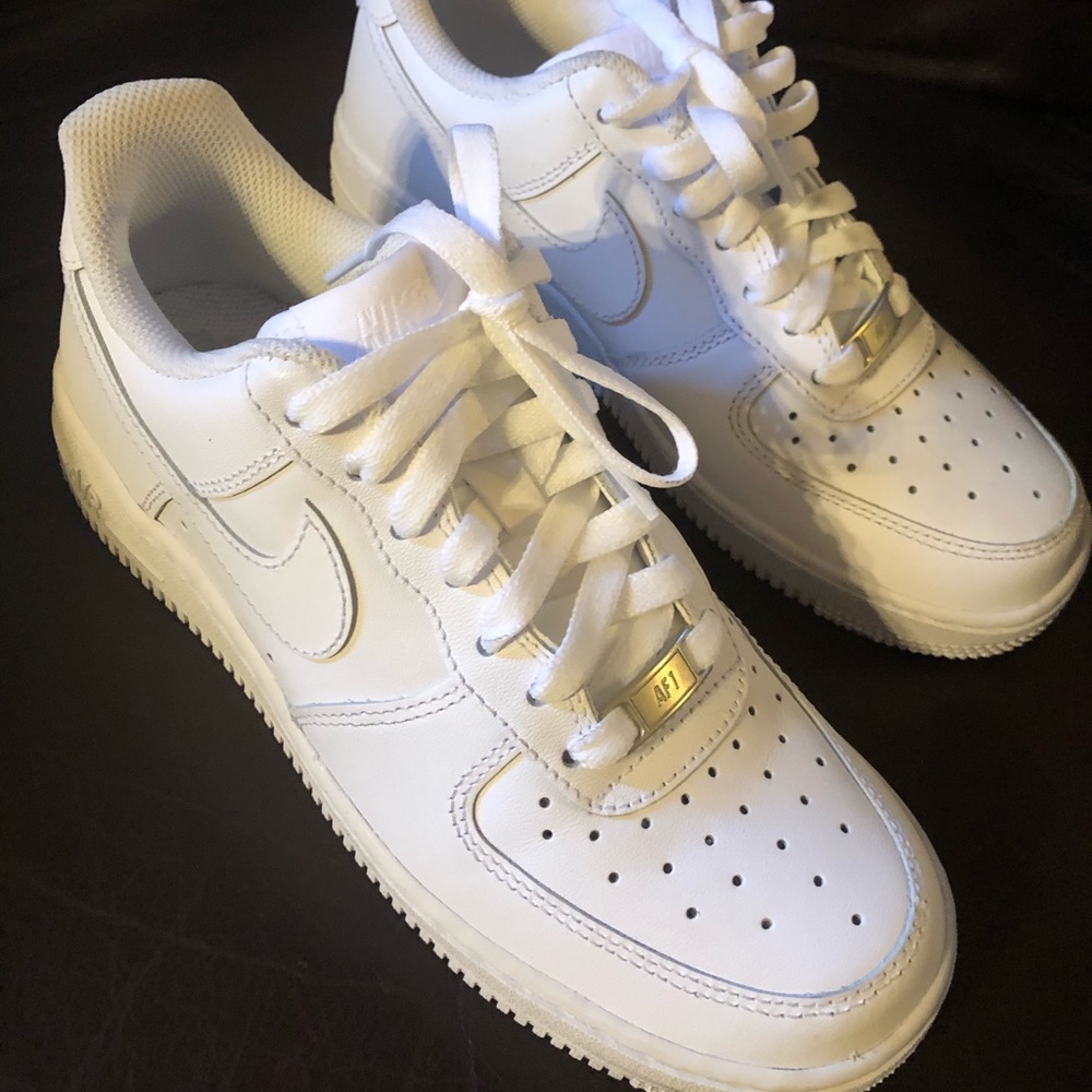 Nike Air Force 1s , low profile.